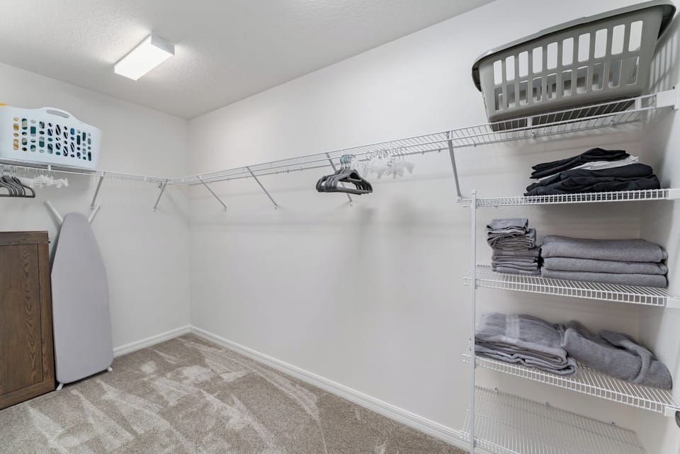 Large Walk-in Closet w/ Ironing Board and Iron