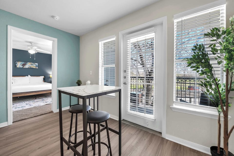 Dining nook set beside the living space, perfect for shared meals or morning coffee.