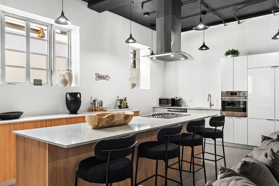 Cook, chat, and sip in style – this open-concept kitchen is the heart of the home.