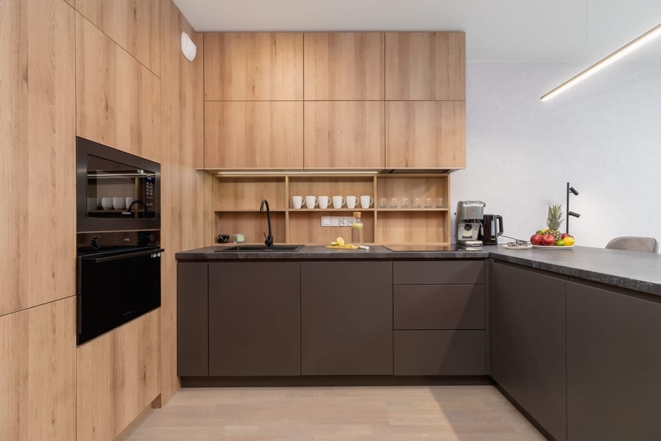 The kitchenette features a spacious fridge and freezer for all your groceries.