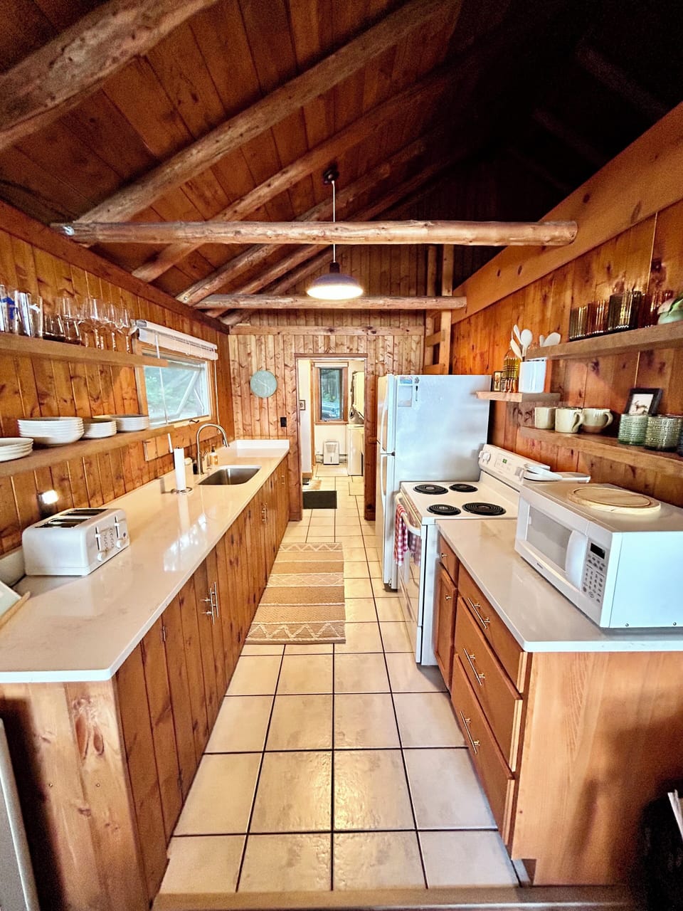 Fully stocked kitchen with quartz countertops