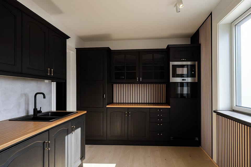 Modern black-wood fully equipped kitchen with built-in appliances for long stays