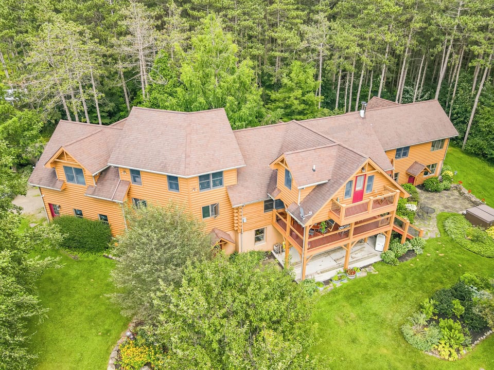 Beautiful custom-built home with expansive outdoor living space, perfect for entertaining or enjoying quiet evenings.