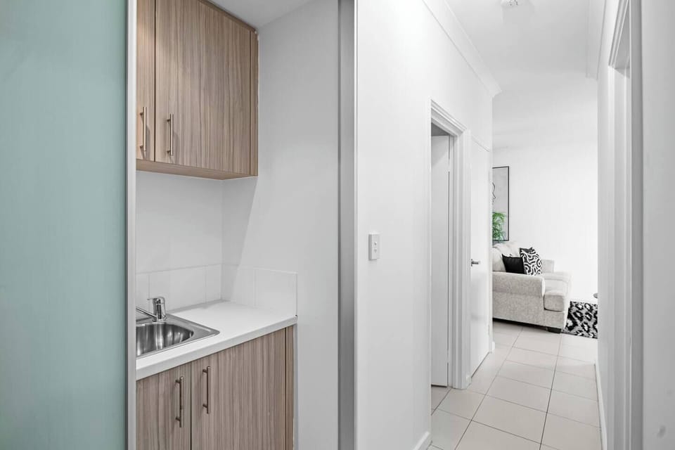 Tucked away laundry space to keep it all out of the way!