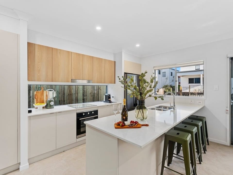Kitchen with full-size appliances, Nespresso and generous bench space.