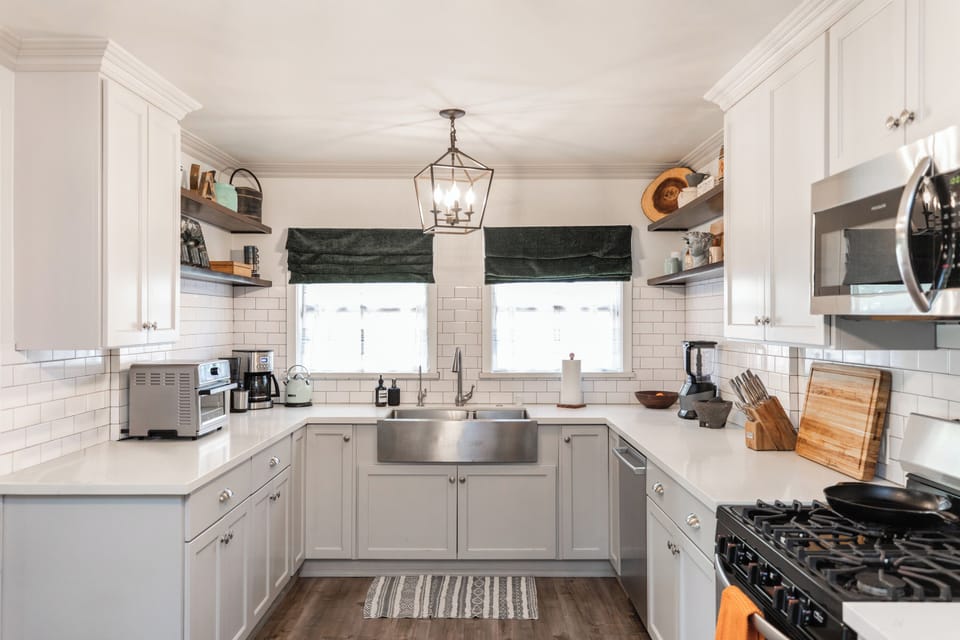 Bright and spacious kitchen featuring stainless steel appliances