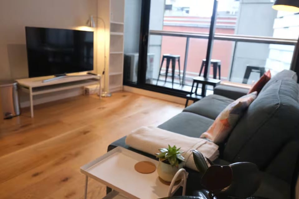 Cozy living room space with a large TV to cast your content (using Chromecast)