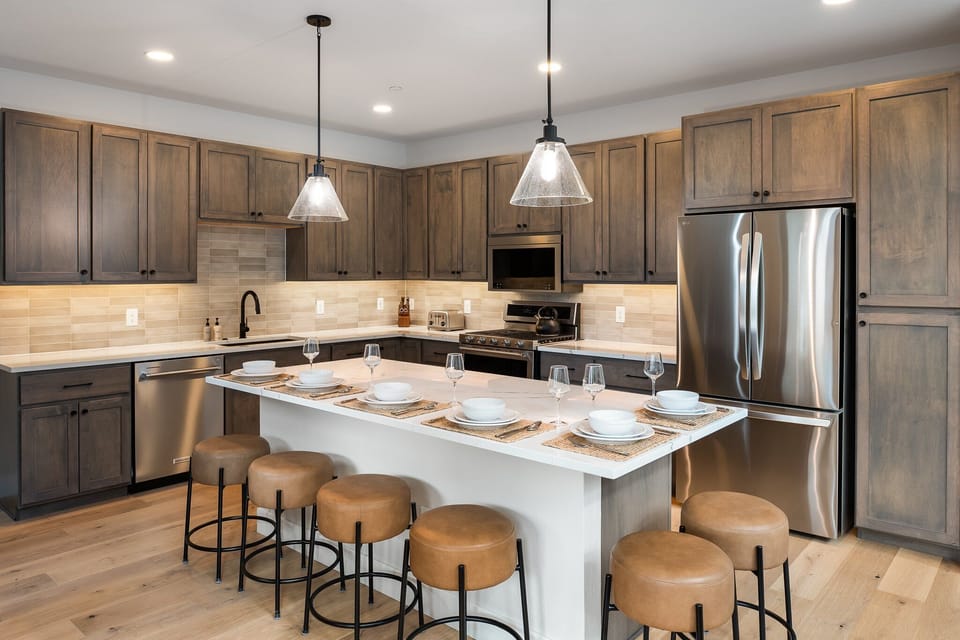 Kitchen Area with High End Appliances and Kitchen Island Seating
