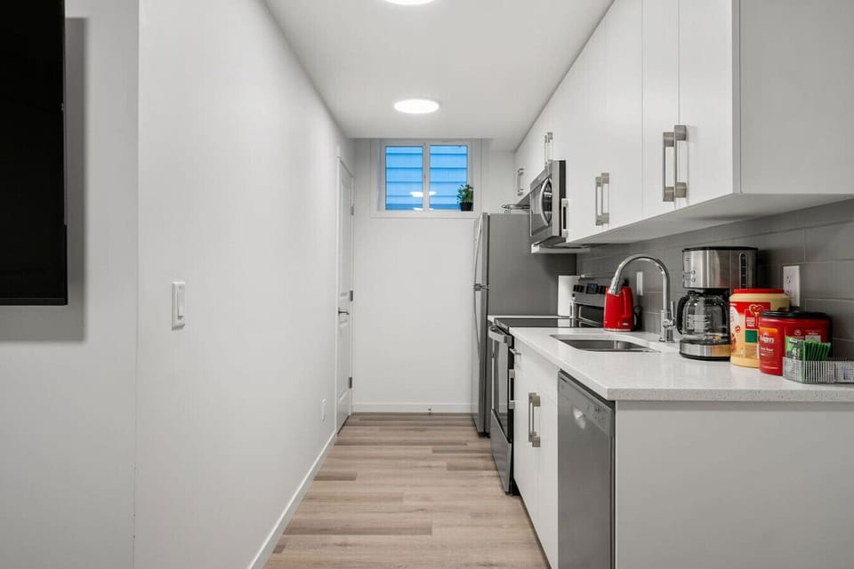 Well-equipped kitchen featuring stainless steel appliances and ample counter space
