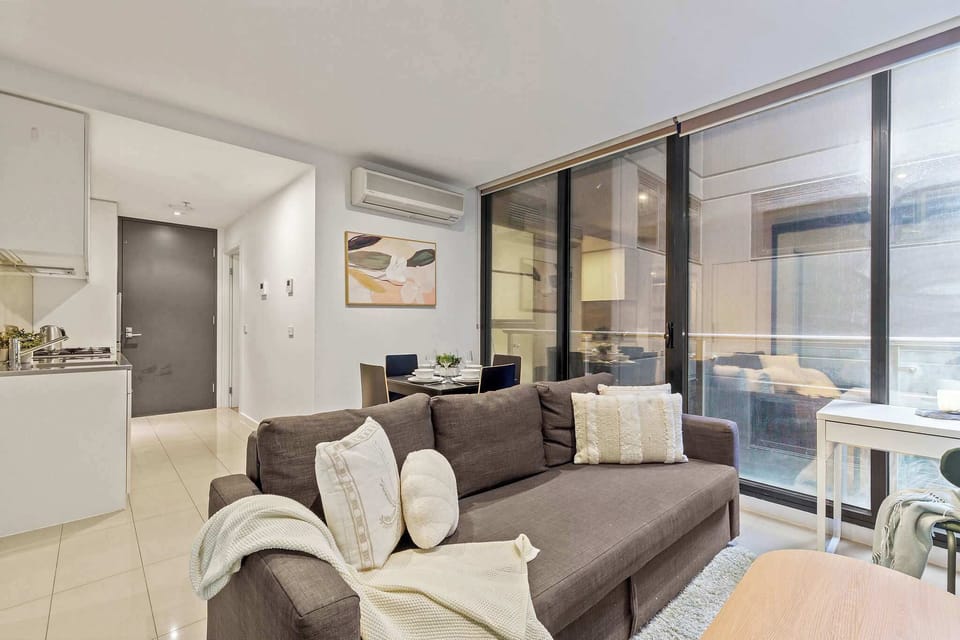 A spacious living with a 3-seater sofa bed that folds out to a double.