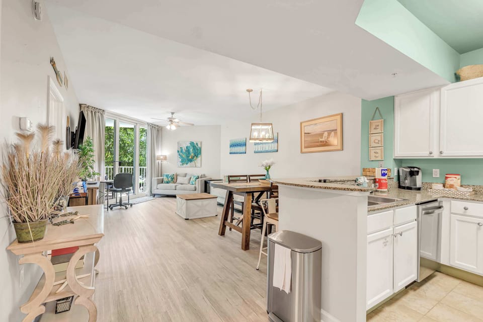 Open Floor Concept. View from the Front Door of the Kitchen and the Dining Area and Living Room