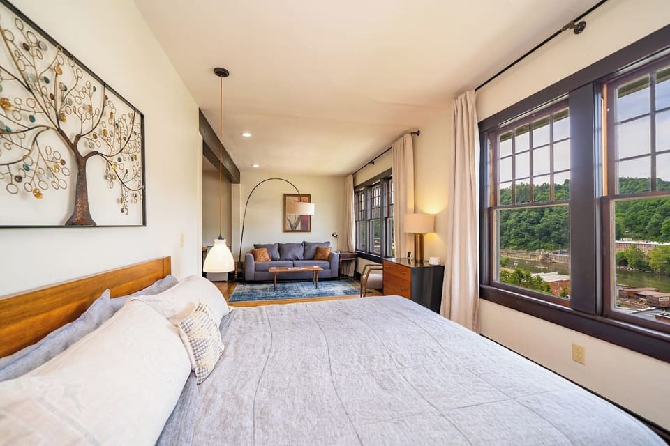 Room #4 on the second floor with a king bed, pullout queen sofa bed and an en suite bathroom.