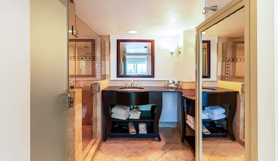 Refresh effortlessly with a roomy vanity and spa-like finishes.