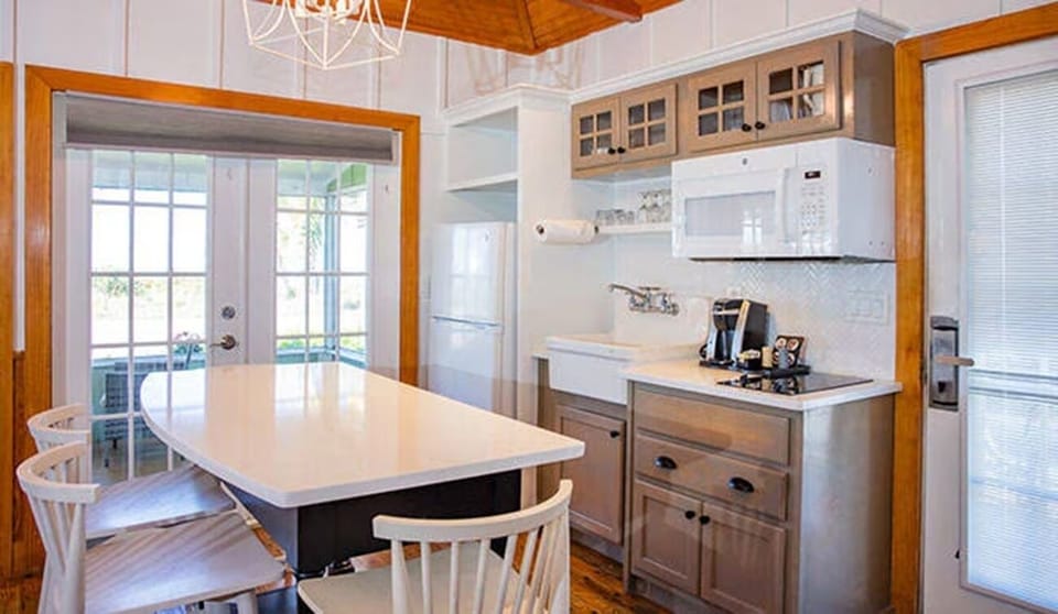 Cook easy meals in a bright kitchen with generous dining table.