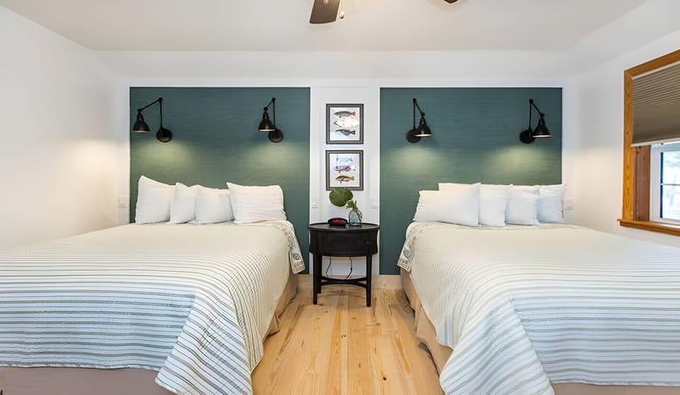 Stretch out and sleep soundly in two crisp queen beds.