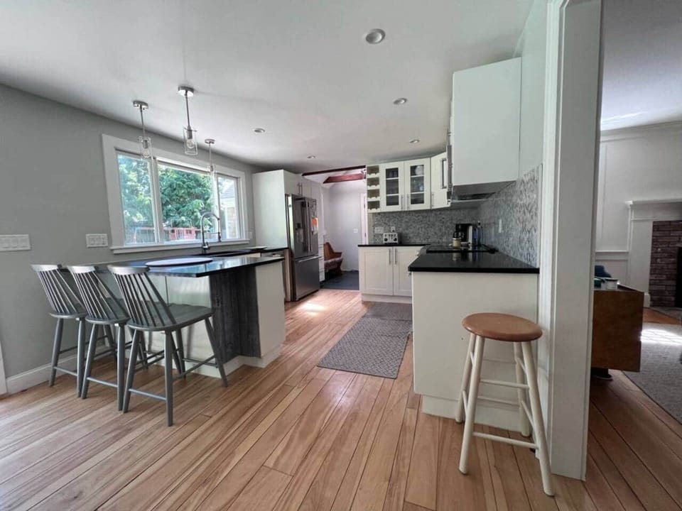 First floor: eat-in kitchen, French door fridge, microwave/convection oven, stove/oven, toaster, coffee, electric kettle, dishwasher, extra-large under-mount sink, mud room & access to garage. 