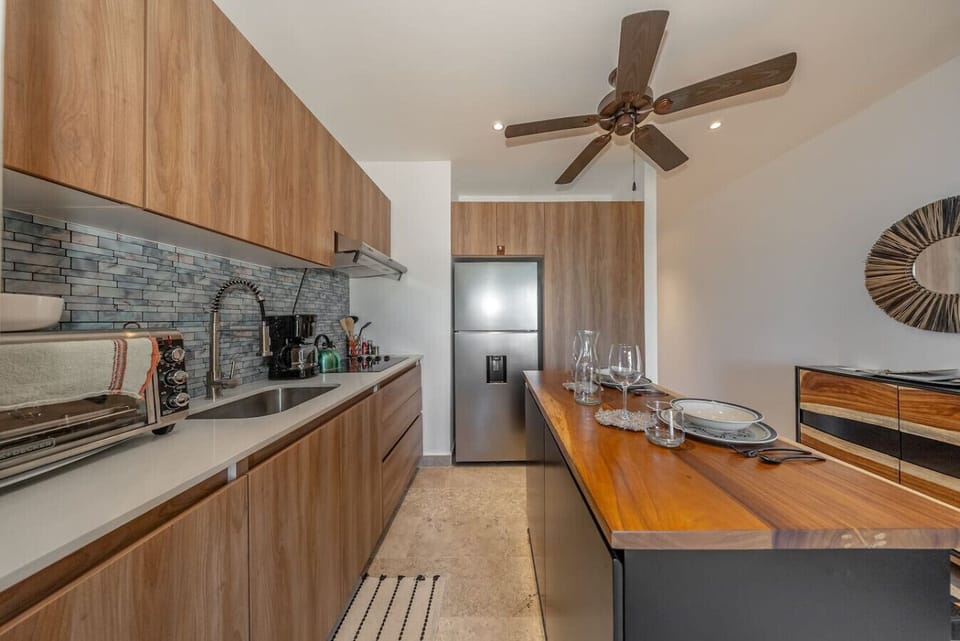 Cook, dine, and relax in this bright and inviting kitchen and dining space