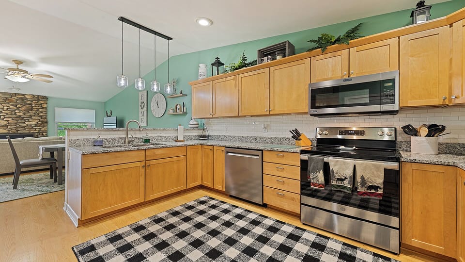 Fully equipped kitchen with modern appliances & spacious counters