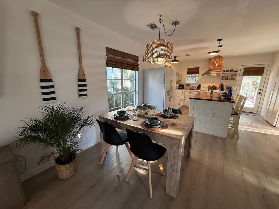 Spacious Kingfish kitchen & dining area — modern design, island seating & plenty of room to gather.