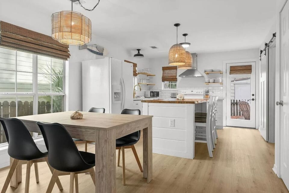 Spacious Kingfish kitchen & dining area — modern design, island seating & plenty of room to gather.