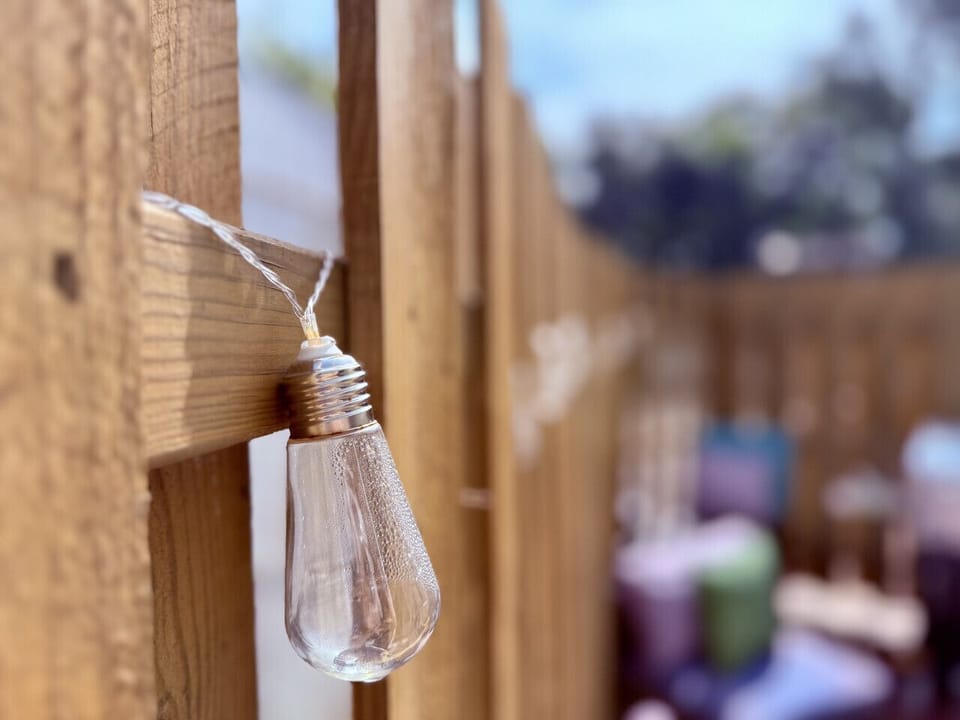 Private deck complete with grill, seating, and propane fire table.