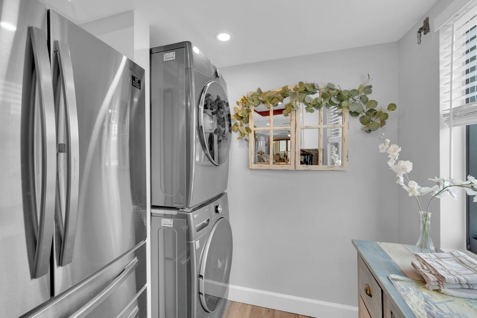 Washer and dryer located in the unit
