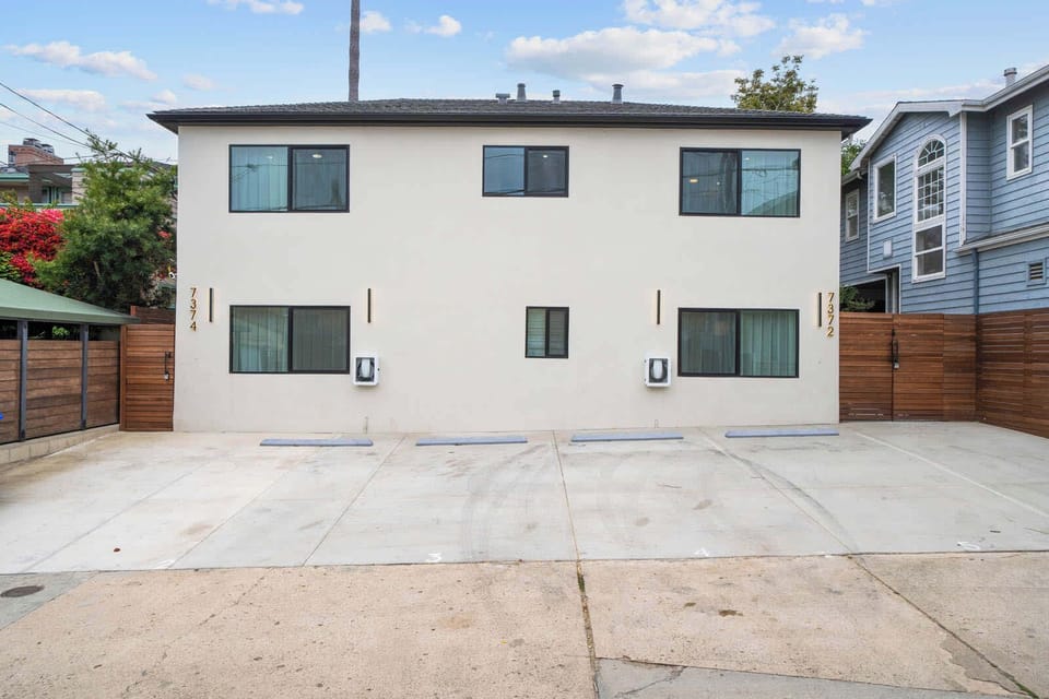 Private outdoor parking is available right in front of the building, offering easy access and added convenience for your stay.