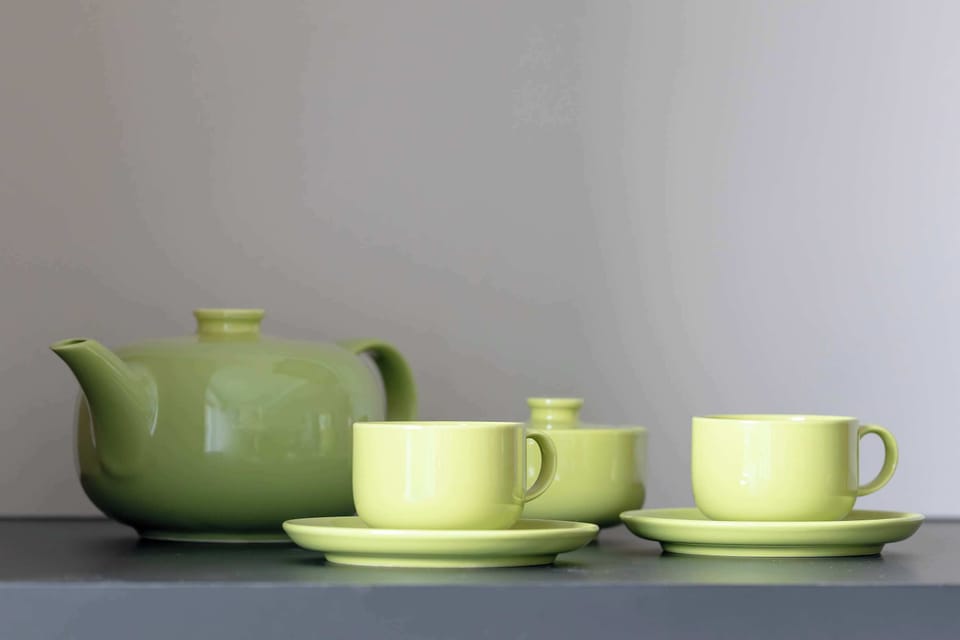 Decorative tea set adding a touch of sophistication.