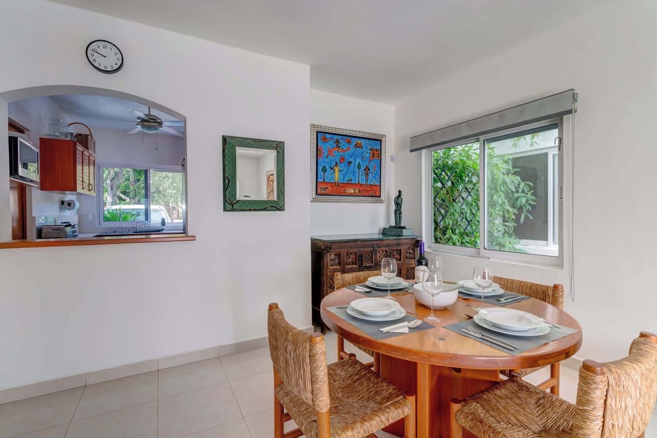 Enjoy meals together in this charming dining area, filled with natural light.