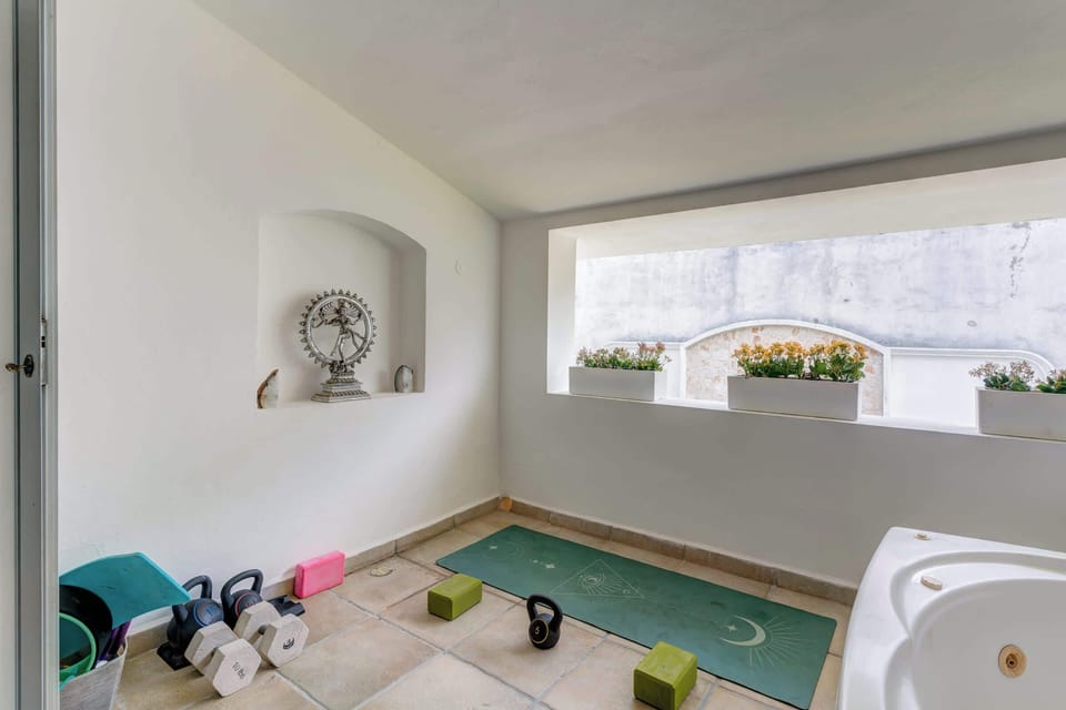 Unwind in this unique space with a spacious built-in soaking tub.