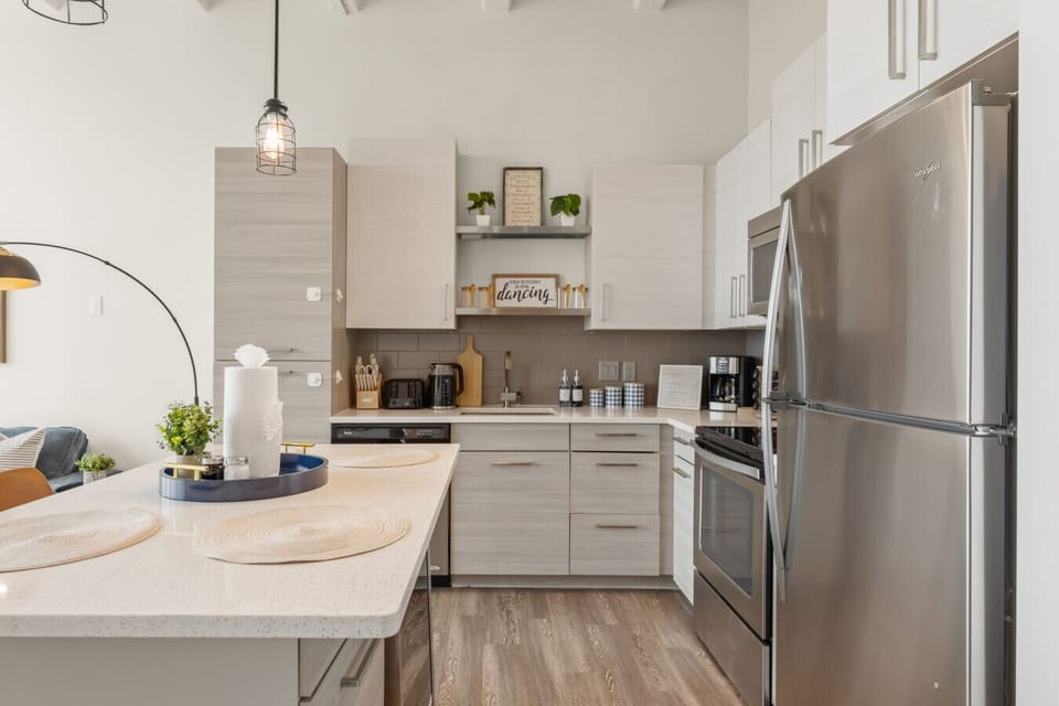 Kitchen: Sleek finishes and bright accents await your culinary adventures in Atlanta!