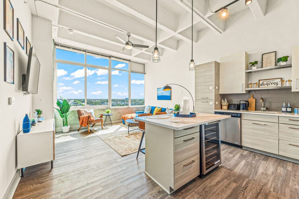 Living Area: Enjoy panoramic views and stylish decor in this spacious, light-filled retreat!