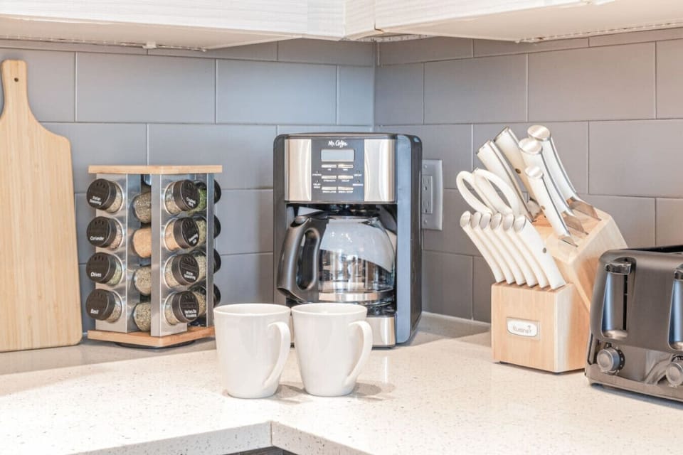 Kitchen: Brew your morning magic with top-tier appliances and a rainbow of spices at your fingertips!