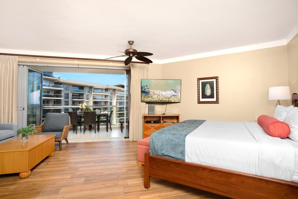 Enjoy ocean breezes and balcony access right from your king-size bed in this bright and airy master studio HKH-537
