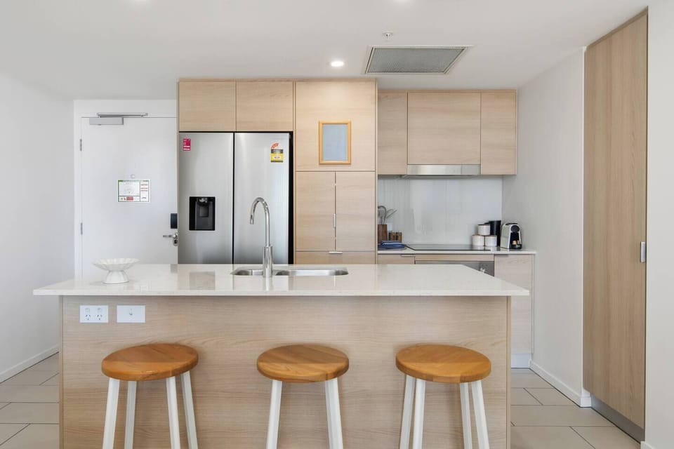 The fully equipped kitchen includes an oven, microwave, stove, full-size fridge, Nespresso machine and all the essentials for holiday cooking with ease.