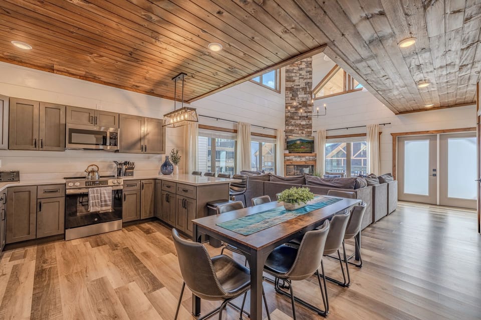 Open-concept kitchen and dining space designed for easy group meals.