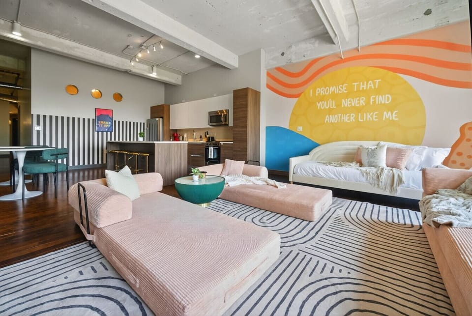 Stretch out on these dreamy pink daybeds — comfort meets chic.