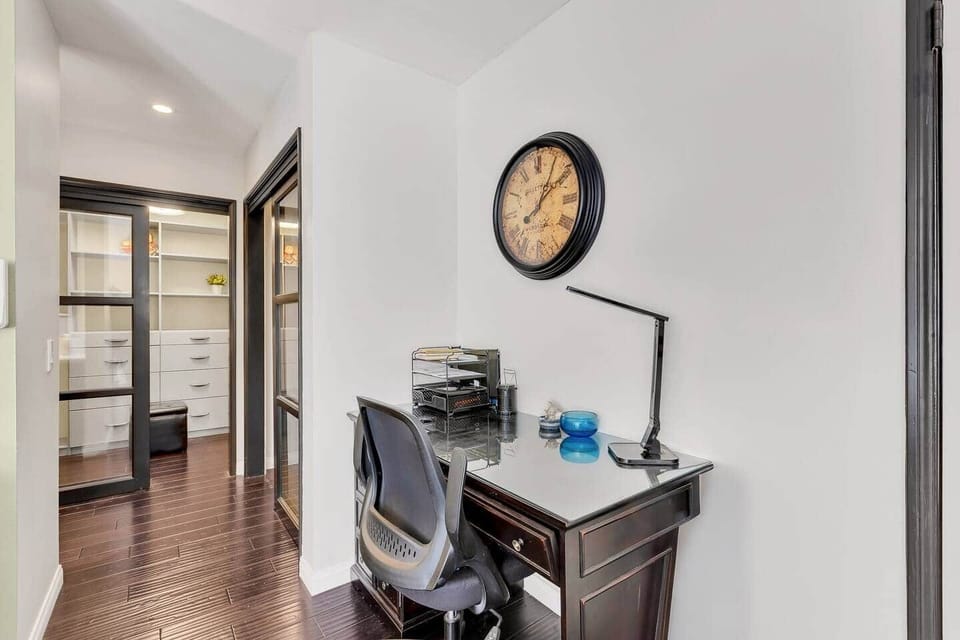 A workspace complete with a desk and chair for work or study.