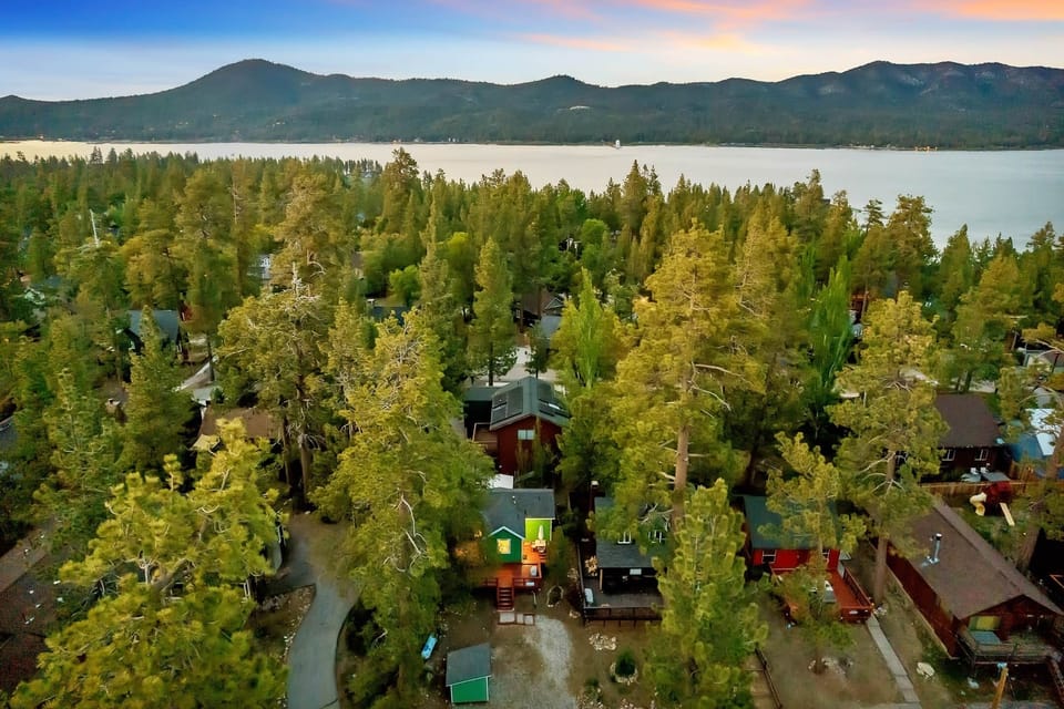 Marvel at the stunning aerial view of this cabin, surrounded by nature's beauty and tranquility.