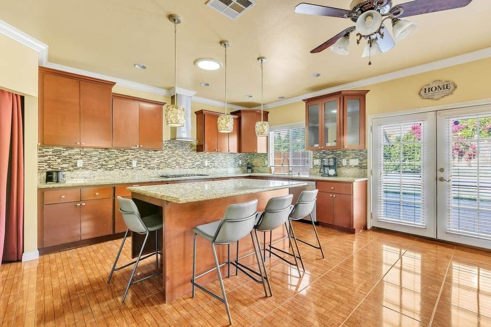 Kitchen with French doors, ample light, and space for everyday cooking.