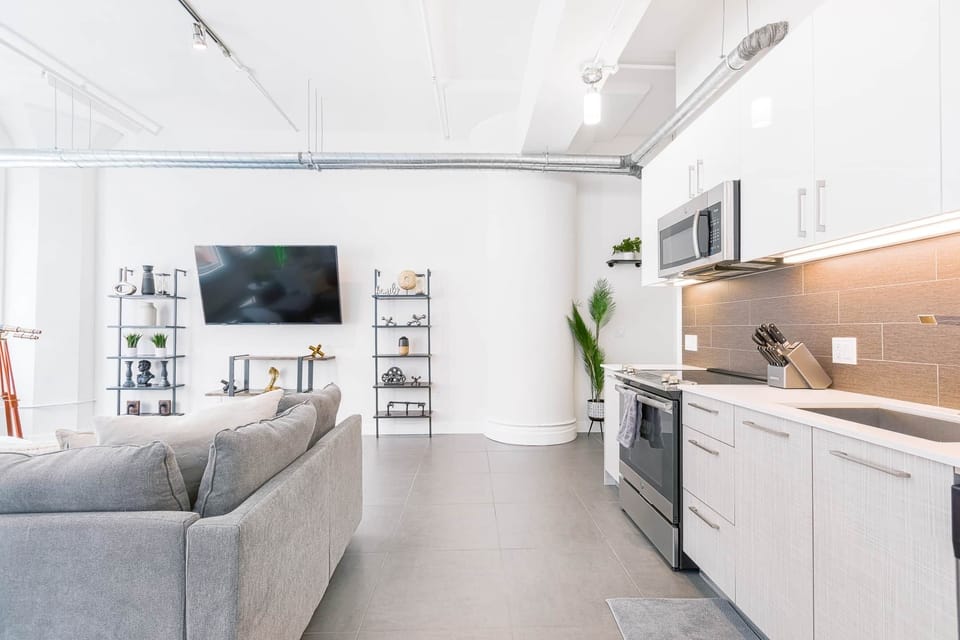 Cook with ease in our modern kitchen, featuring high-end appliances and a spacious island.