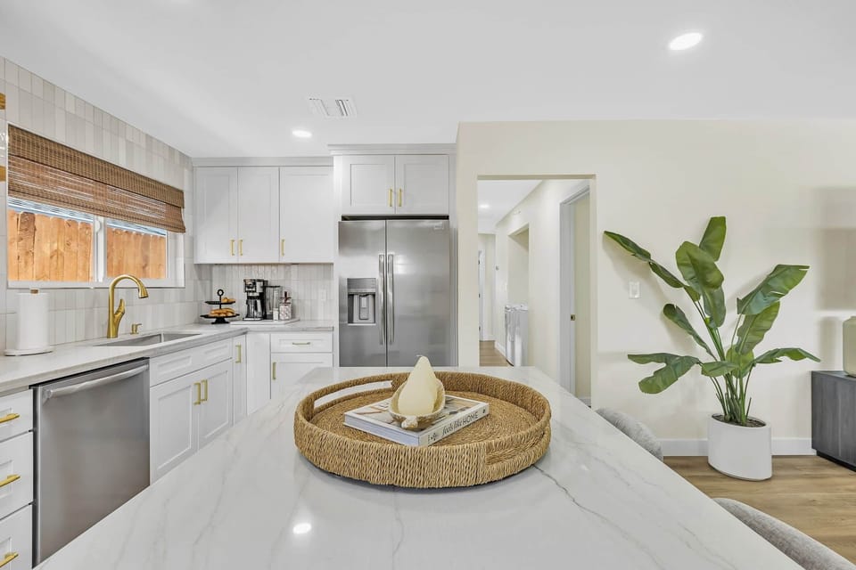 Enjoy ample storage and counter space in our stylish, well-equipped kitchen.