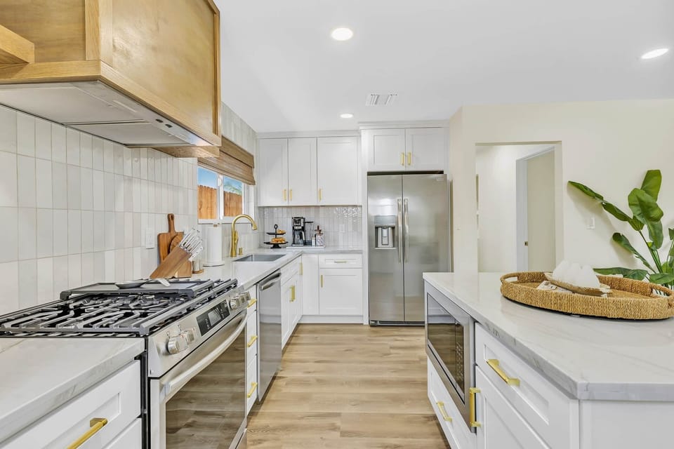 Cook with ease in our kitchen, with ample storage, spacious counters, and sleek design.