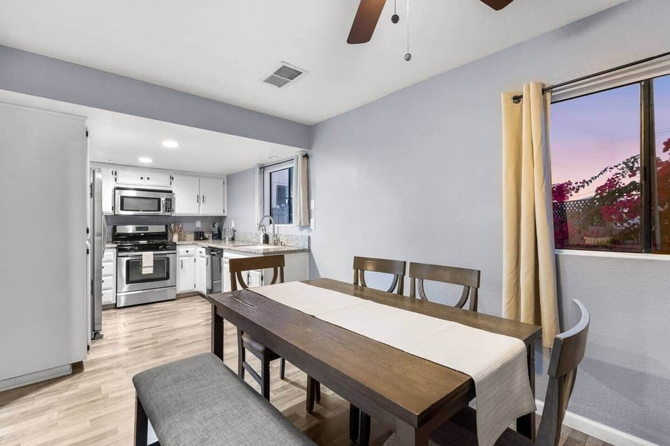 Host with ease—this long wooden table seats up to 8, perfect for meals, game nights, or work.