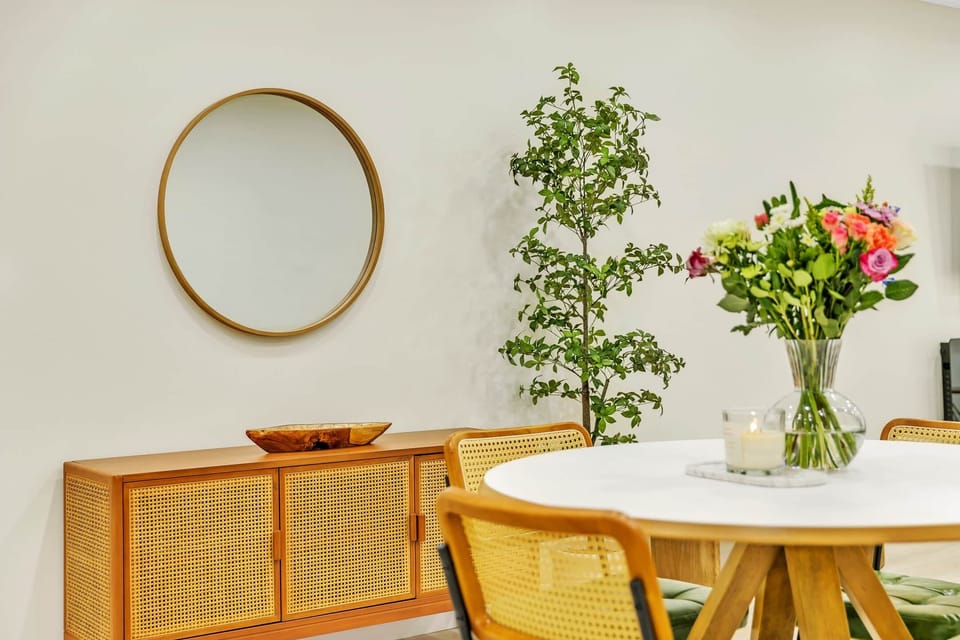 Stylish dining room with natural wood accents