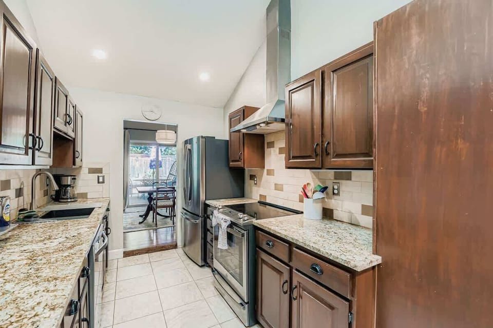 A functional kitchen that flows directly to the dining area, making meal prep and serving easy and convenient.