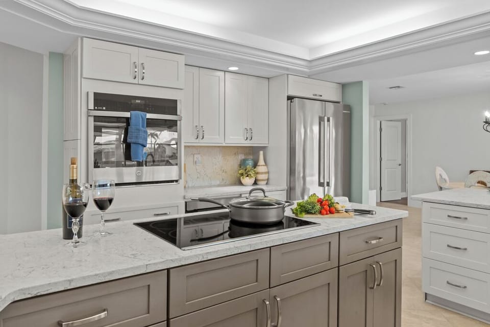 A chef's dream—this modern kitchen blends sleek design with everyday functionality for effortless entertaining.