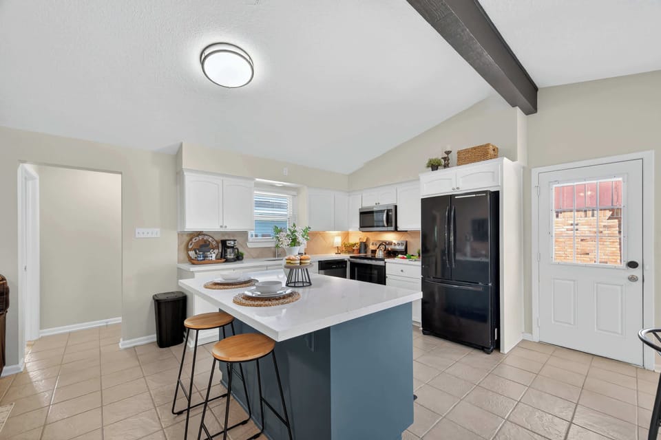 Stylish Kitchen: Sleek designs meet modern appliances for all your culinary adventures!