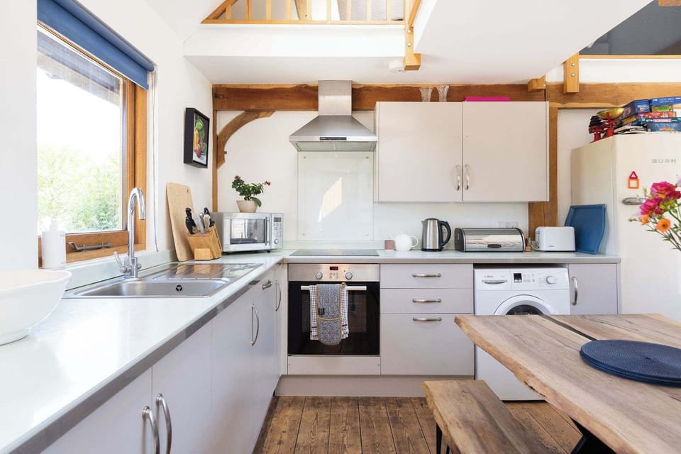 The kitchen provides all the essentials for a comfortable and convenient stay.