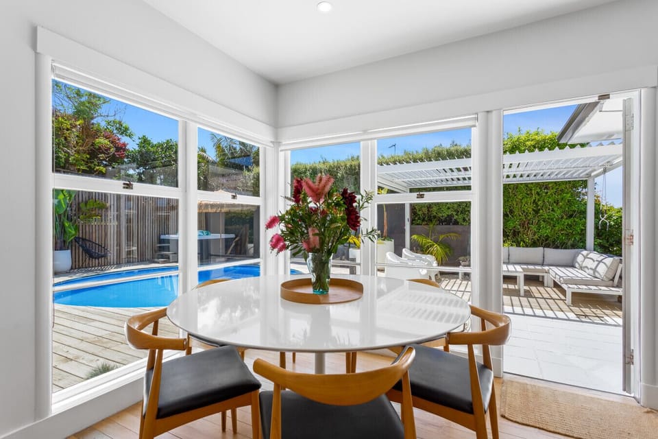 Delightful sunny dining area with outlook to the pool